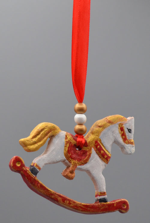 CHEVAL À BASCULE